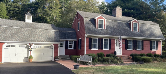 Maroon red cape style home in Whitman